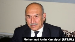 اسحاق اتمر، آگاه سیاسی و استاد دیپلماسی در پوهنتون برلین