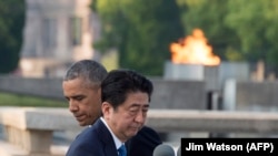 Барак Обама жана Синзо Абэ. Хиросима, 27-май, 2016-жыл.