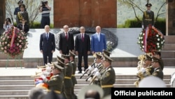 Nagorno Karabakh -- Robert Kocharian (left), Bako Sahakian (second from left) and Arkadi Ghukasian (right) attend an official ceremony in Stepanakert, 9 May, 2015.