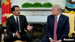 Катардын эмири Шейх Тамим бин Хамад аль-Тани АКШнын президенти Дональд Трамп менен жолуккан учур. Вашингтон, 10-апрель, 2018-жыл.