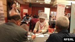 Айгүл Акималиева.