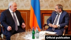Armenia -- Armenian Prime Minister Nikol Pashinian (R) meets CSTO chief Yuri Khachaturov, Yerevan, 17May2018