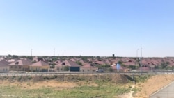 Отремонтированные дома в центральной части Арыси.