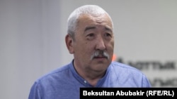 Исхак Масалиев.