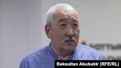 Исхак Масалиев.