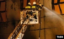 Firefighters battle the warehouse blaze.