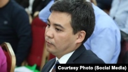 Руслан Адил.