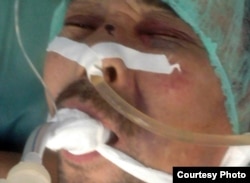 Базарбай Кенжебаев под системой в больничной палате. Жанаозен, декабрь 2011 года.