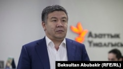 Алмамбет Шыкмаматов.