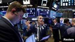 Нью-Йорк биржасындагы соодагерлер. 13-июнь, 2018-жыл.