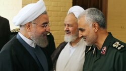 Президент Ірану Гасан Рогані (л) під час зустрічі з генералом Касемом Сулеймані в Тегерані, 15 вересня, 2015 року