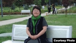 Сүйүн Курманова.