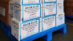 Chinae -- Boxes of medical supplies are loaded onto a transport plane bound for Armenia, April 8, 2020.