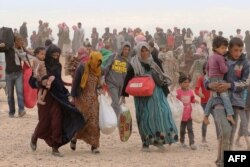 Беженцы из Сирии, покинувшие свои дома из-за нападений исламистов. 4 мая 2016 года.