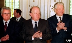 Ukrainian President Leonid Kravchuk (left), Belarusian leader Stanislau Shushkevich (center), and Russian President Boris Yeltsin after signing the Belavezha Accords on December 8, 1991.
