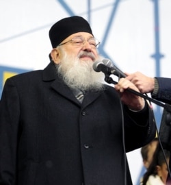 Революція гідності. Колишній голова Української греко-католицької церкви (УГКЦ) кардинал Любомир Гузар під час Народного віча на майдані Незалежності в Києві, 8 грудня 2013 року