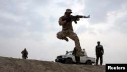 "Ислам мамлекетине" каршы согушуу үчүн армияга кошулган шиит согушкерлери. 29-январь, 2015.