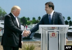 Дональд Трамп и Михаил Саакашвили, 22 апреля 2012 года