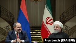 IRAN -- Armenian Prime Minister Nikol Pashinian meets with Iranian President Hassan Rohani at the Saadabad Palace in Tehran, February 27, 2019