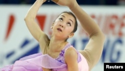 Элизабет Турсынбаева, казахстанская фигуристка.