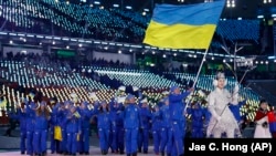 Украиналык спортчулар Түштүк Кореядагы Кышкы олимпиаданын ачылышында. 2018-жыл. 