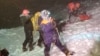Members of the Emergency Situations Ministry conduct a rescue operation after the group of climbers got stuck on Mount Elbrus.