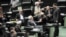 Иран парламенти талаштуу Ядролук келишим үчүн добуш берген күнү. 11-октябрь 2015.