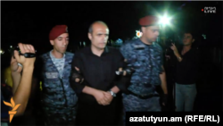 Armenia -- Police officers detain civic activist Levon Barseghian after a rally on Khorenatsi street in Yerevan, 27Jul2016