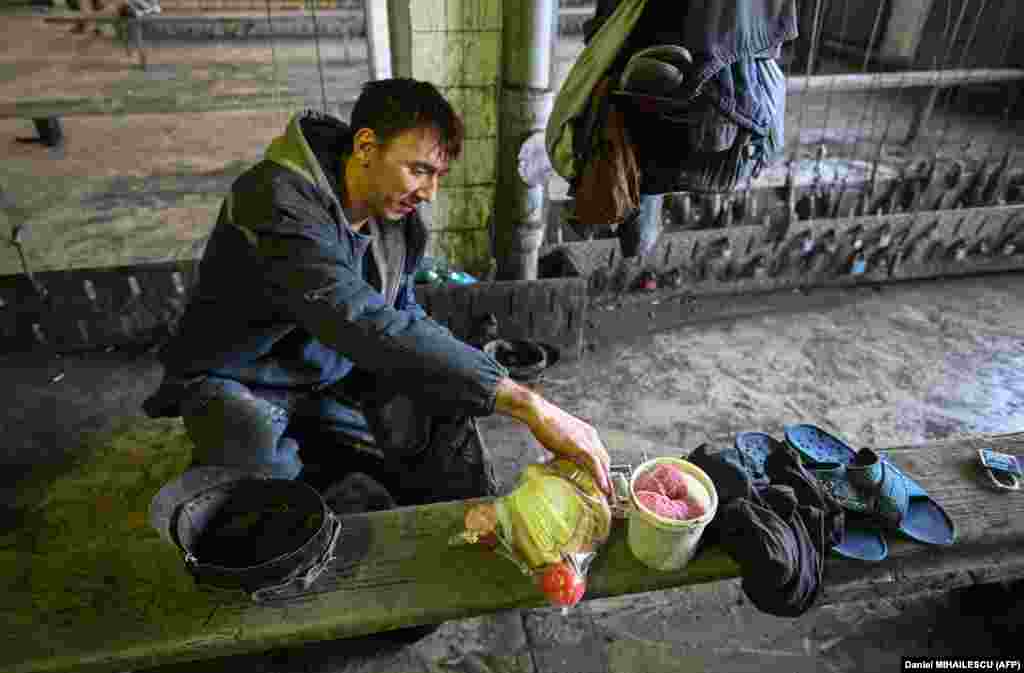 A miner picks up his meal at the Lonea mine.