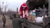 Волонтер-Санта Клаус відвідав українських бійців (відео)