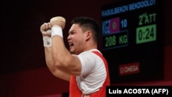 Архив сүрөт. Бекдөөлөт Расулбеков Олимп оюндарында. Токио, Жапония. 2021-ж.