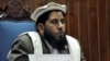 Fazal Hadi Muslimyar addresses senators after his election as Senate chairman in Kabul on March 11.