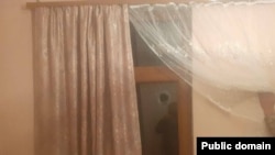 Armenia - A bullet hole on a window glass in a house in the village of Khoznavar, April 23, 2025.