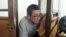 Амин Елеусинов, бывший председатель профсоюза нефтяников нефтесервисного предприятия Oil Construction Company, в суде. Астана, 14 марта 2017 года.
