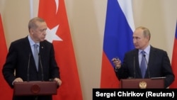Туркия президенти Ражаб Тоййиб Эодўғон ва Россия президенти Владимир Путин. (Озодлик архивидан)