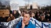 Antigovernment protesters rally in front of a government building in Sarajevo on February 10.