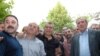 Armenia -- Opposition leader Levon Ter-Petrosian (R) and a group of his supporters released from jail pose for a photograph on 22Jun2009