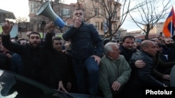 Armenia -- Opposition leader Ishkhan Saghatelian addresses protesters outside the parliament building in Yerevan, March 9, 2021.