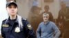 American investor Michael Calvey sits inside a defendants' cage as he attends a court hearing in Moscow on February 15.