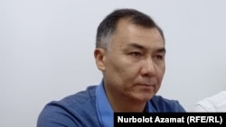 Равшан Жээнбеков.