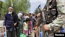 Кыргызстанга кайтып келе жаткан качкындар