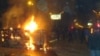 Armenia -- A car set on fire during the 01Mar2008 clashes in Yerevan between opposition protesters and security forces