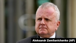 Жон Салливан.