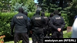 Armenia - NSS officers arrive at the Echmiadzin headquarters of the Armenian Apostolic Church to try to arrest Archbishop Mikael Ajapahian, June 27, 2025.