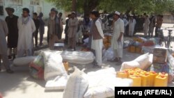 تصویر آرشیف: جریان توزیع کمک های غذایی در ولایت جوزجان 