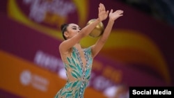 Айша Изабекова.