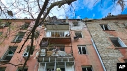 Снаряди влучили в одну з будівель у Центральному районі міста (ілюстраційне фото)