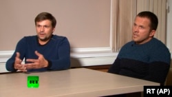 Ռուսաստան - Որպես Ալեքսանդր Պետրով և Ռուսան Բոշիրով ներկայացող անձինք հարցազրույց են տալիս RT-ին, Մոսկվա, 13-ը սեպտեմբերի, 2018թ․