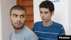 Armenia -- Opposition activists Davit Kiramijian (L) and Sargis Gevorgian at the start of their trial in Yerevan, 14July 2010.