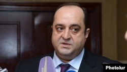Armenia -- Justice Minister Hovannes Manukian speaks to reporters.